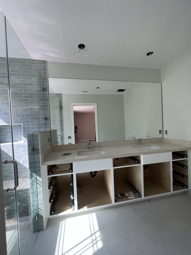 Custom corner glass shower enclosure