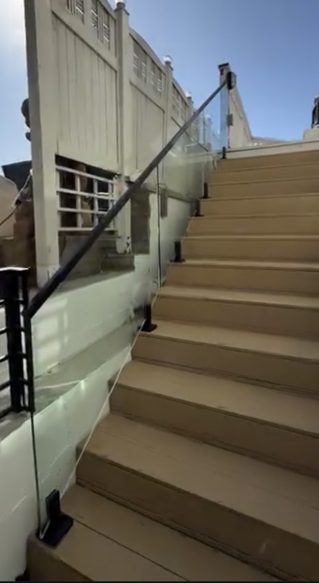Completed glass staircase railing installation