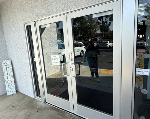 Storefront glass door installation